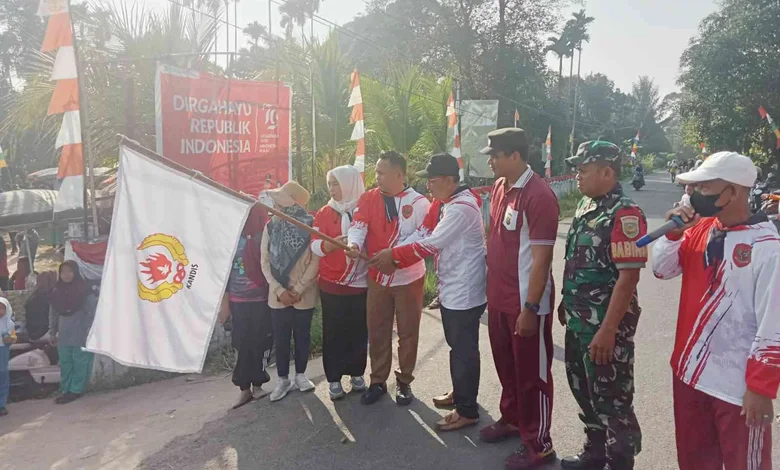 Mewakili Kapolsek, Kapospol Kandis Mengikuti Giat Jalan Santai dan Olahraga Bersama