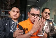Bupati Bolmut Sirajuddin Lasena Resmi Ditahan KPK, Kenakan Rompi Oranye dan Tangan Diborgol