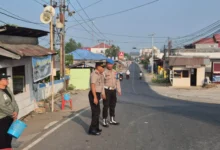 Foto pendukung berita Polsek Modayag Gelar Kegiatan Strong Point dan Pembagian Masker, Dipimpin Langsung Kapolsek